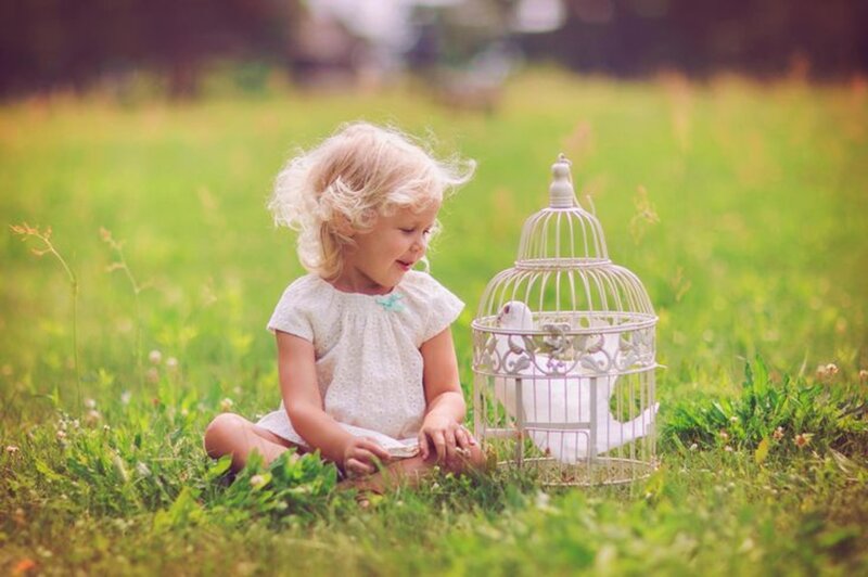 Blonde Girl with Birdcage