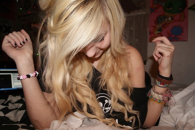 blonde girl with bracelets
