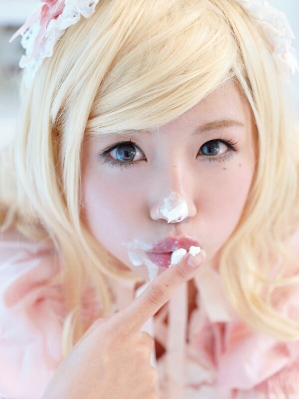 blonde girl with cream on face