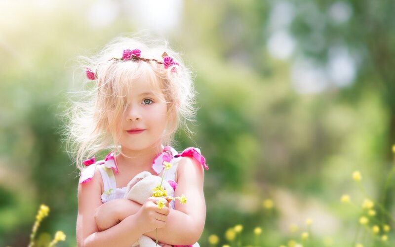 Blonde Girl with Flowers — Green, Serene, Afternoon