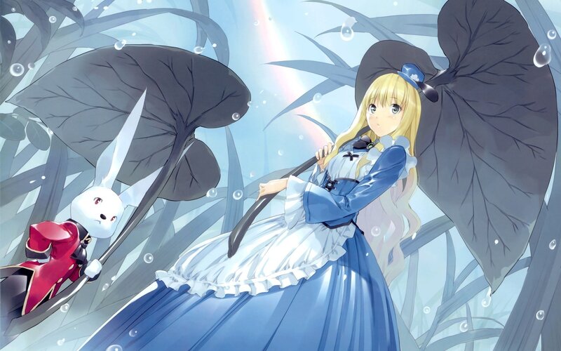 blonde girl with rabbit in garden