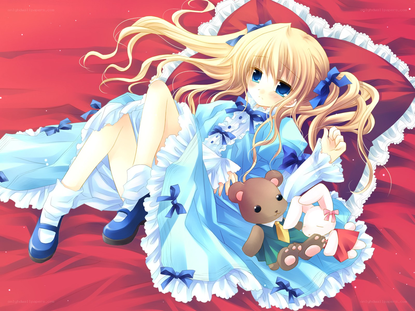 Blonde girl with stuffed animals