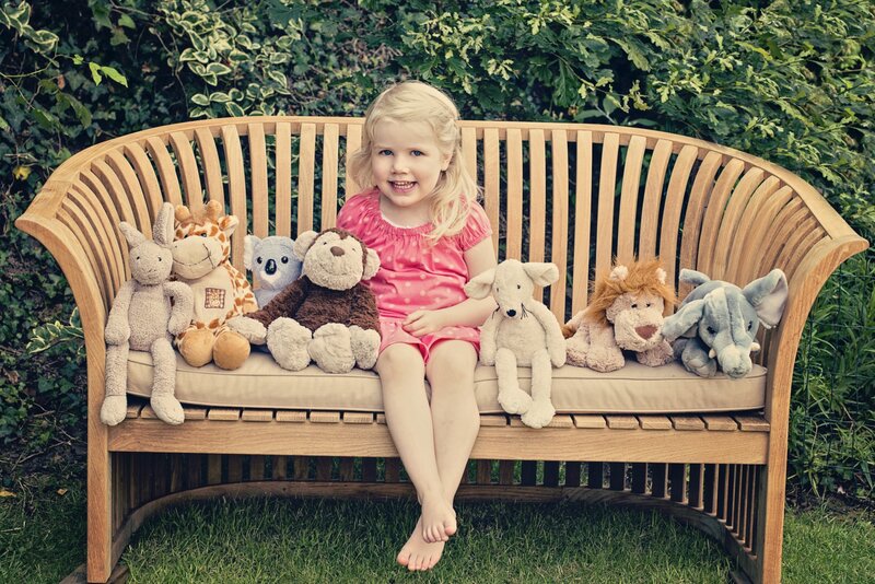 Blonde Girl with Stuffed Animals — Green