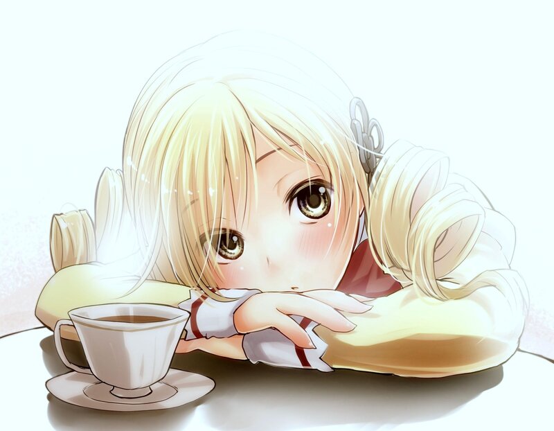 Blonde girl with tea cup