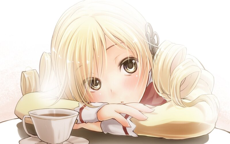 blonde girl with tea cup