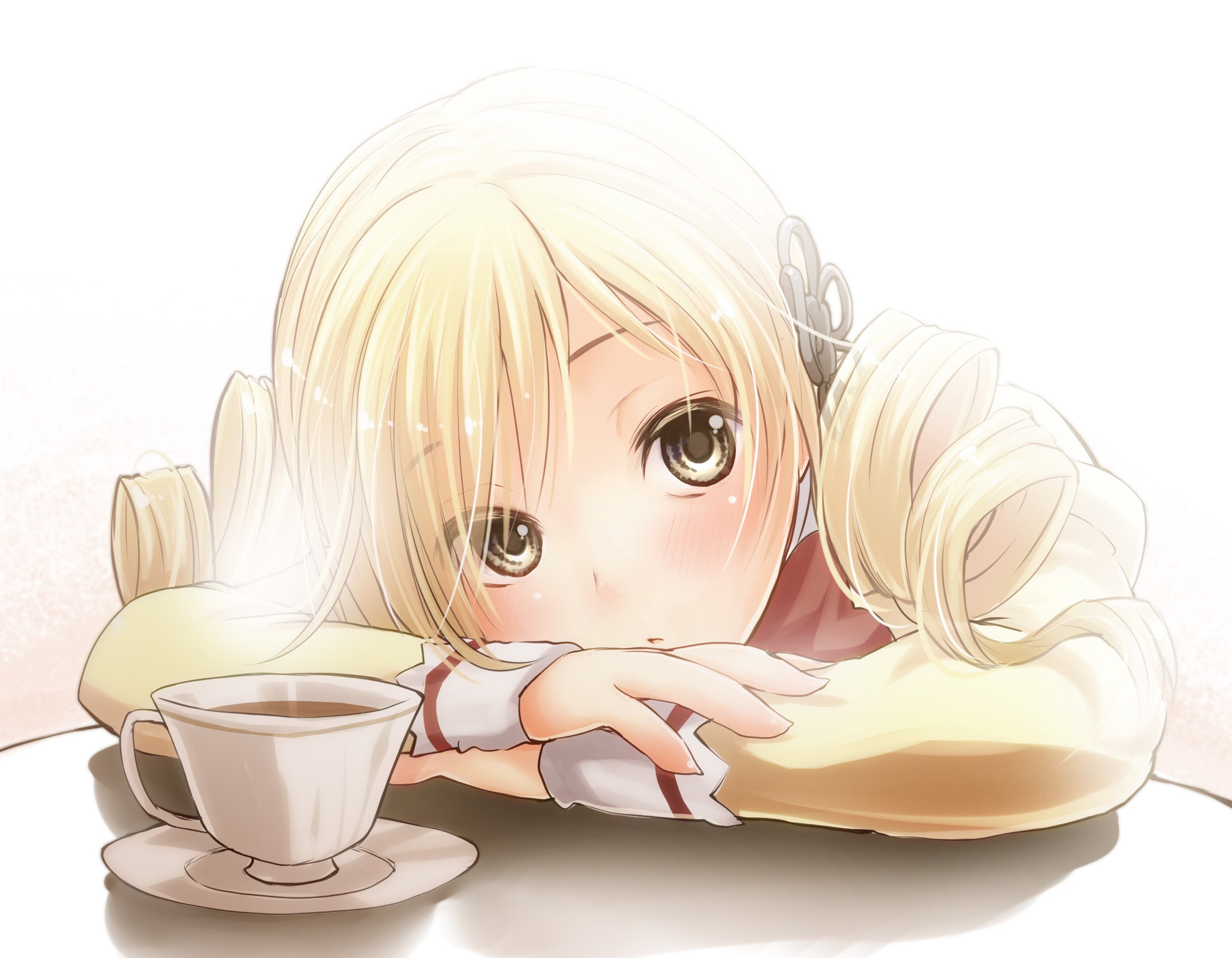 blonde girl with tea cup