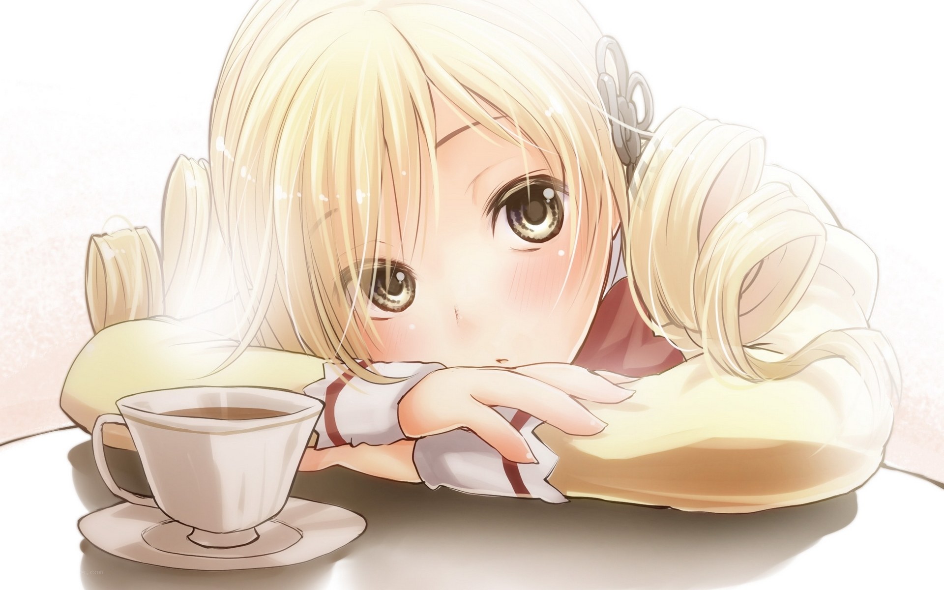 Blonde girl with tea cup