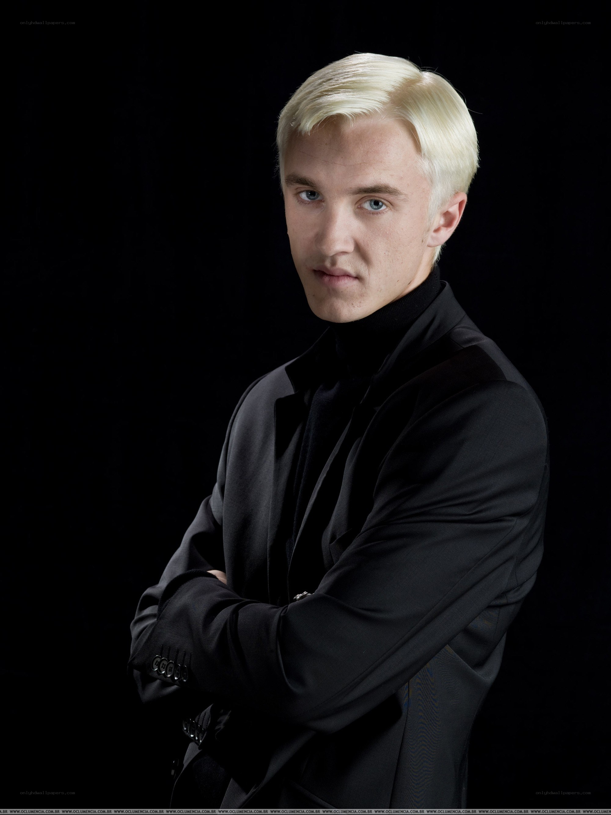 Blonde man in black suit