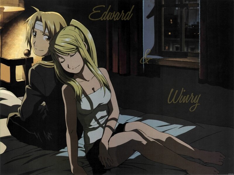Blonde Woman and Man on Bed