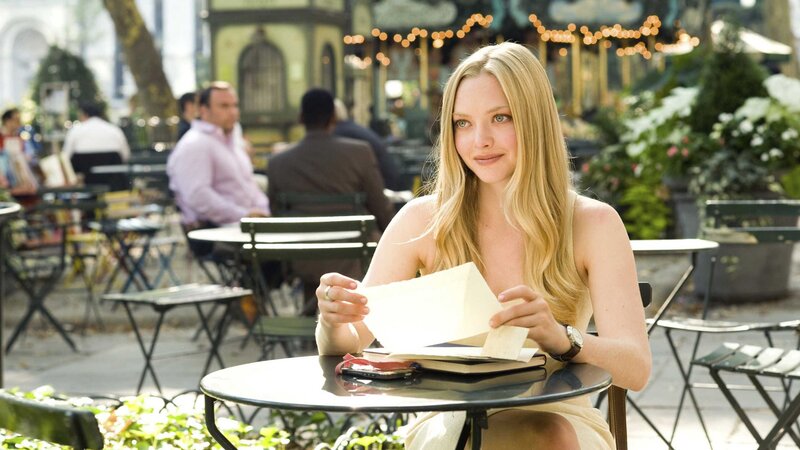 Blonde Woman at Cafe Table