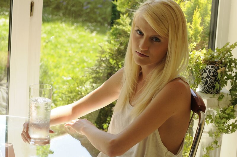 Blonde Woman at Table — White, Calm