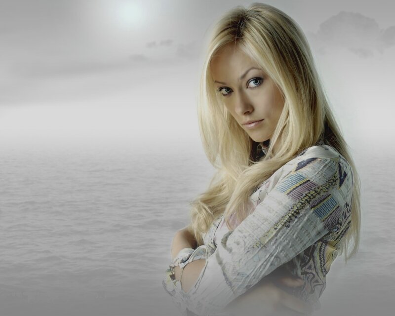 blonde woman by the sea