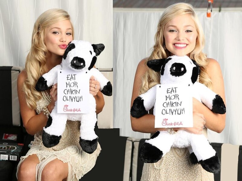 Blonde Woman Holding Cow