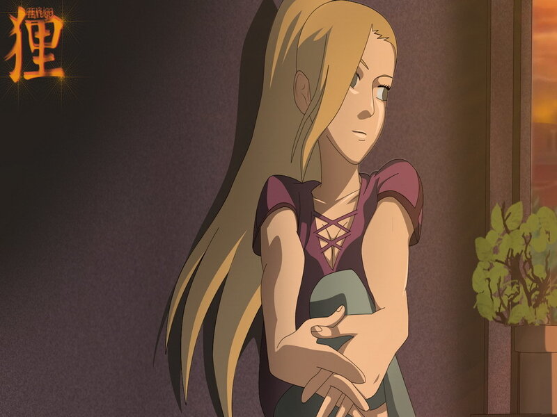 Blonde Woman Hugging Knees — Brown