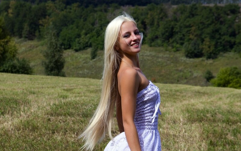 Blonde woman in a field