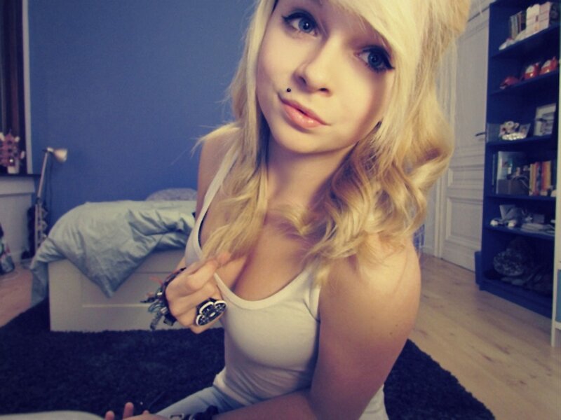 blonde woman in bedroom