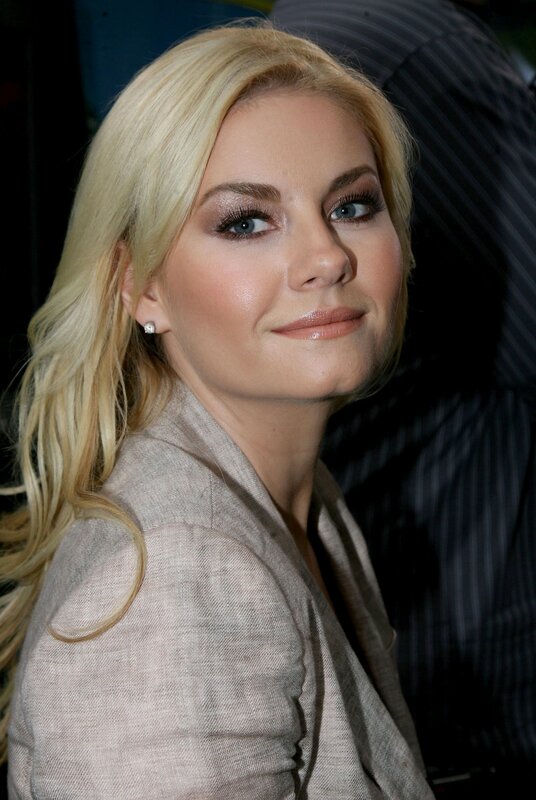 blonde woman in beige jacket