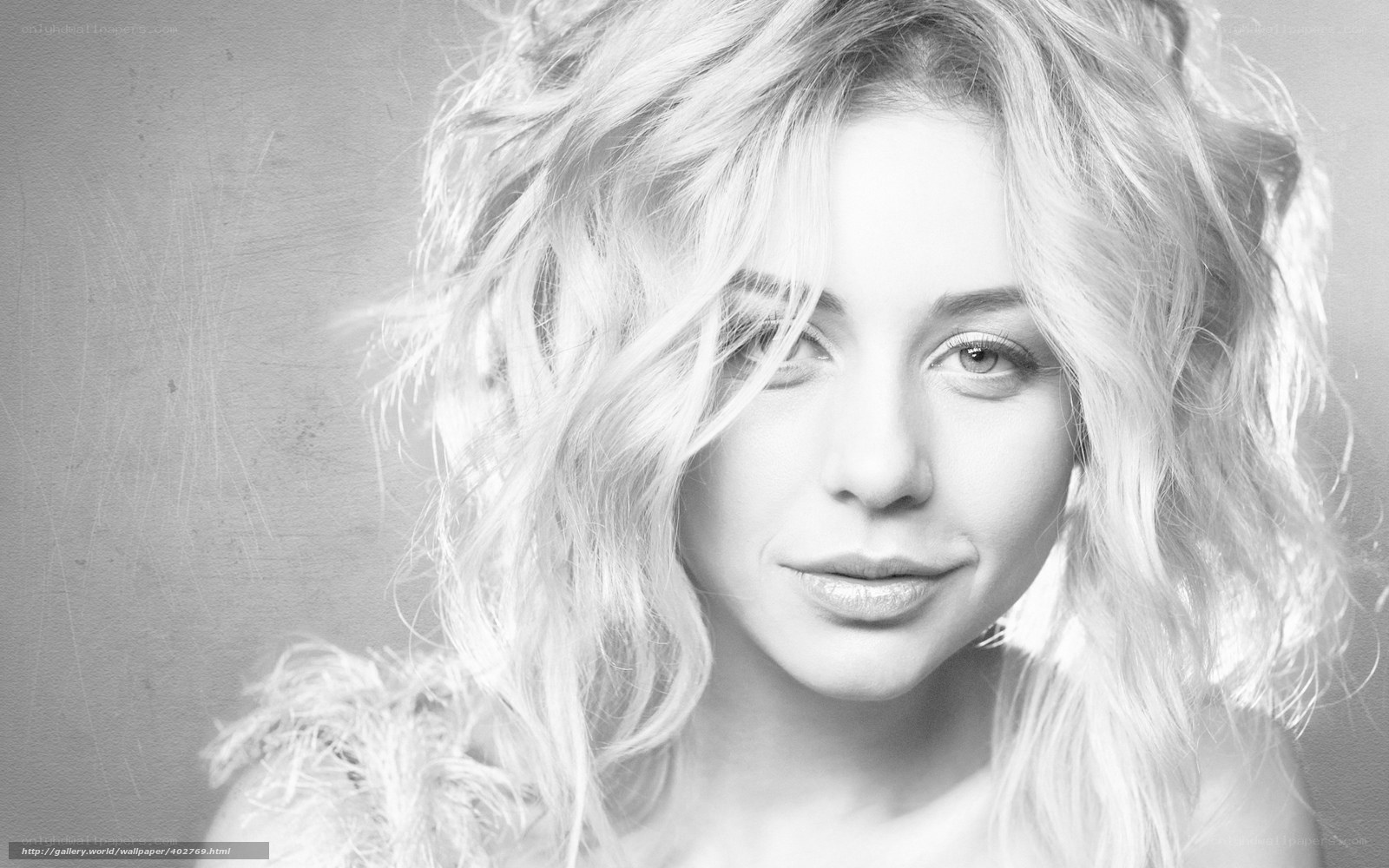 blonde woman in black and white