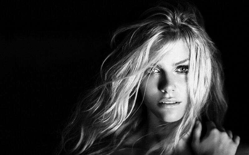 blonde woman in black and white