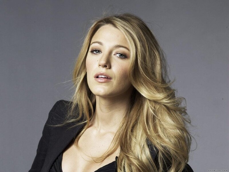 Blonde woman in black blazer