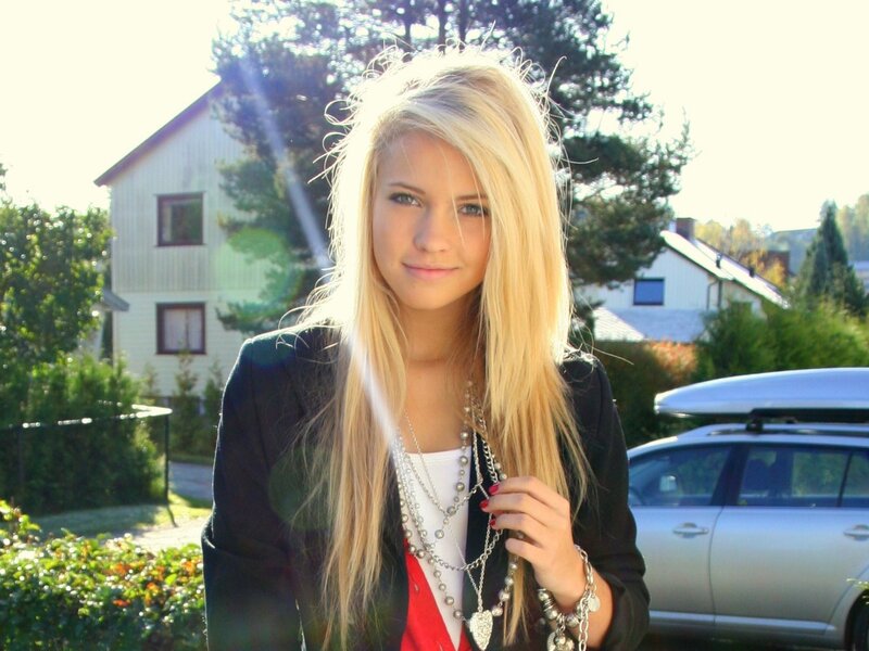 blonde woman in black jacket