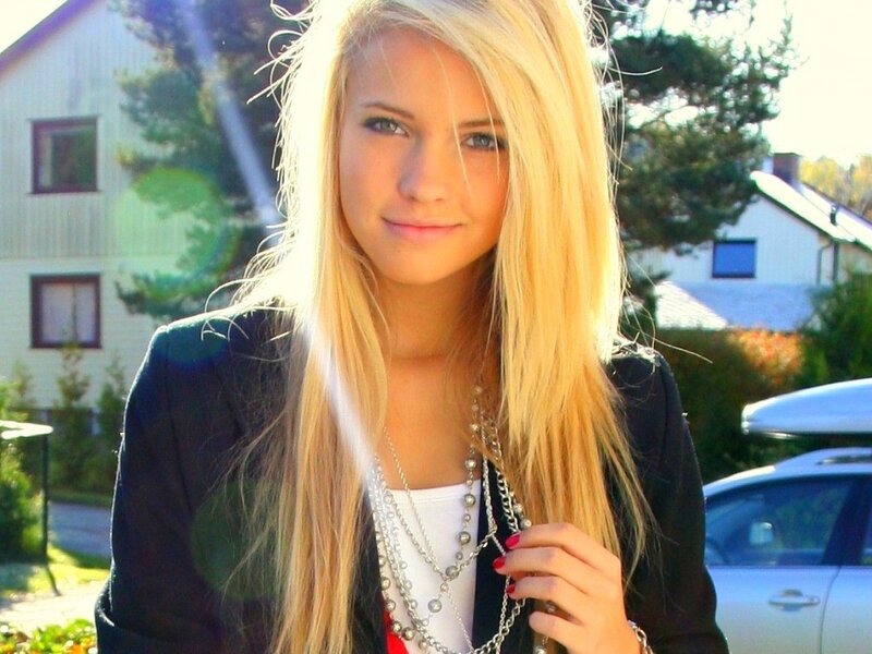 blonde woman in black jacket