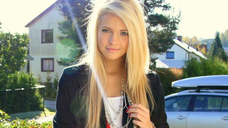 blonde woman in black jacket