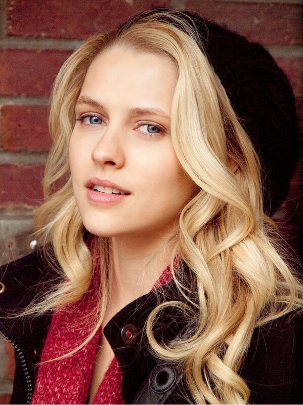 blonde woman in black jacket