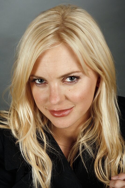 blonde woman in black jacket