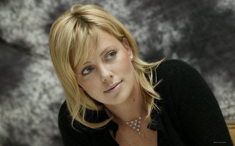 blonde woman in black sweater