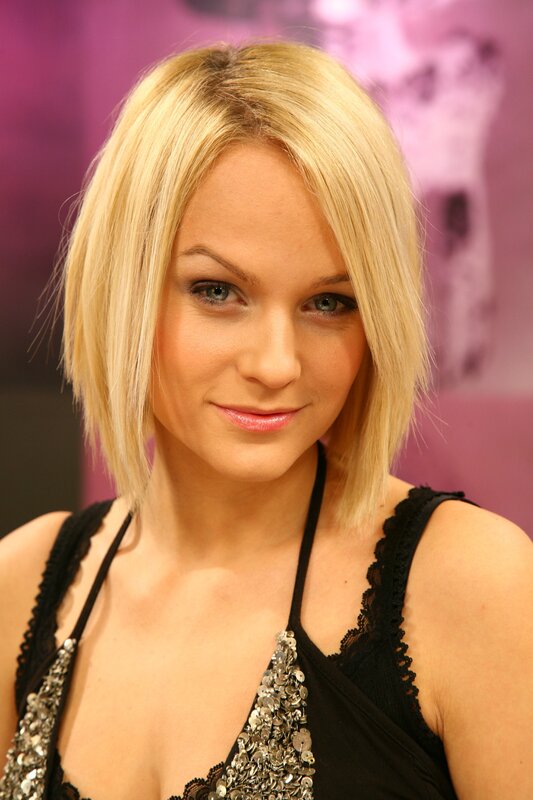 blonde woman in black top