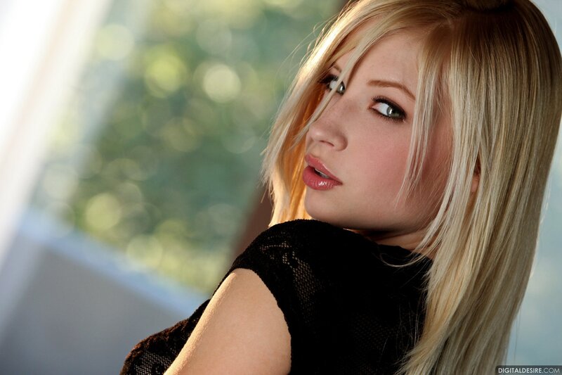 blonde woman in black top