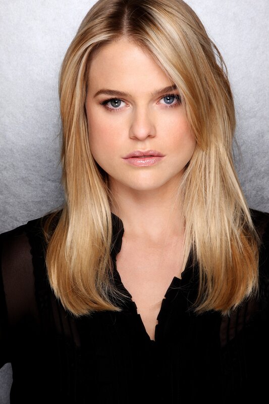 blonde woman in black top