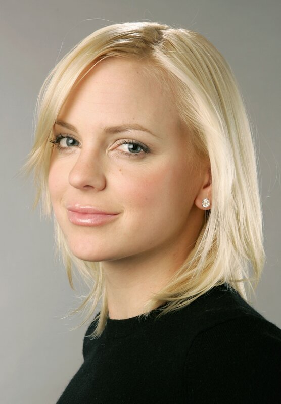 blonde woman in black top