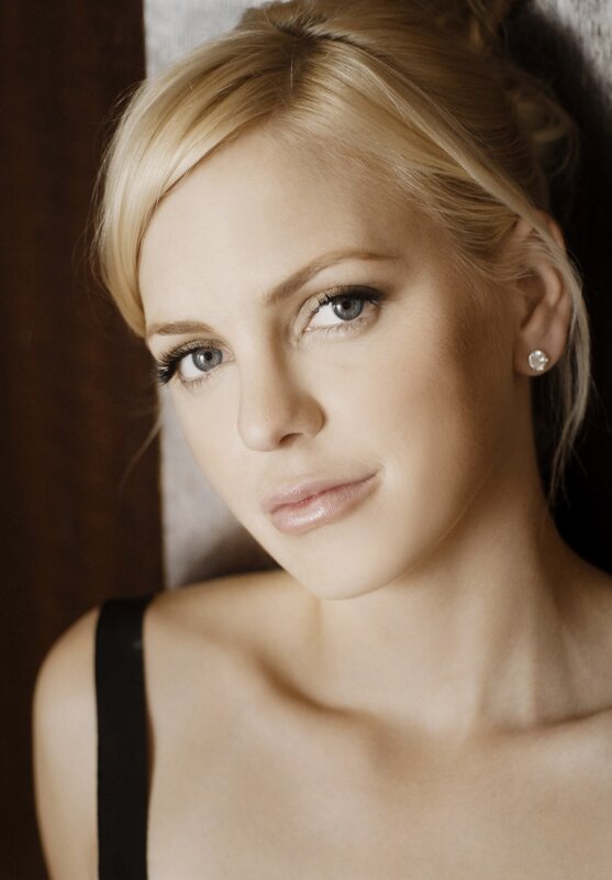 blonde woman in black top