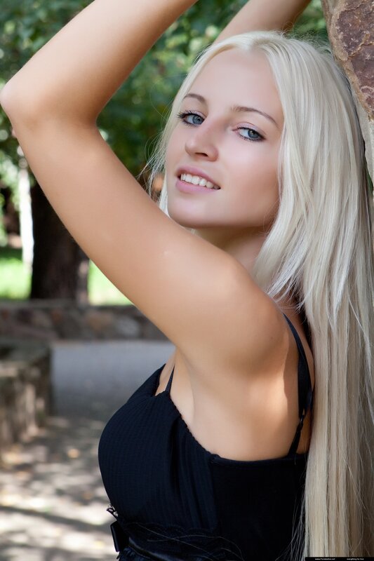 blonde woman in black top