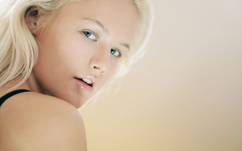 blonde woman in black top