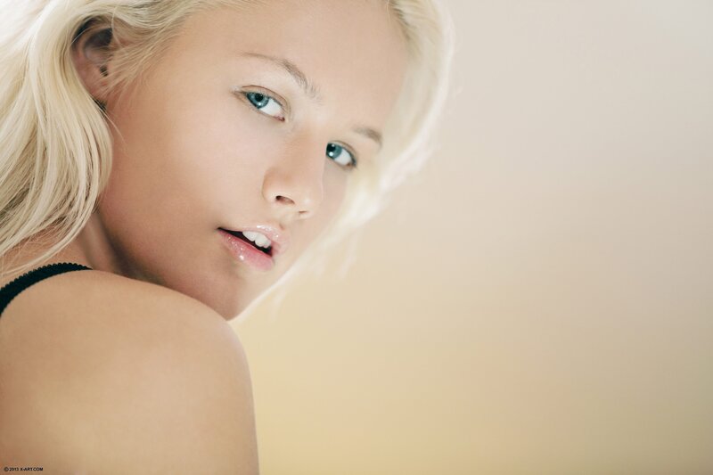 blonde woman in black top