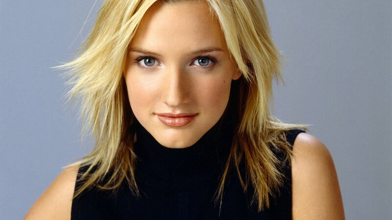blonde woman in black top