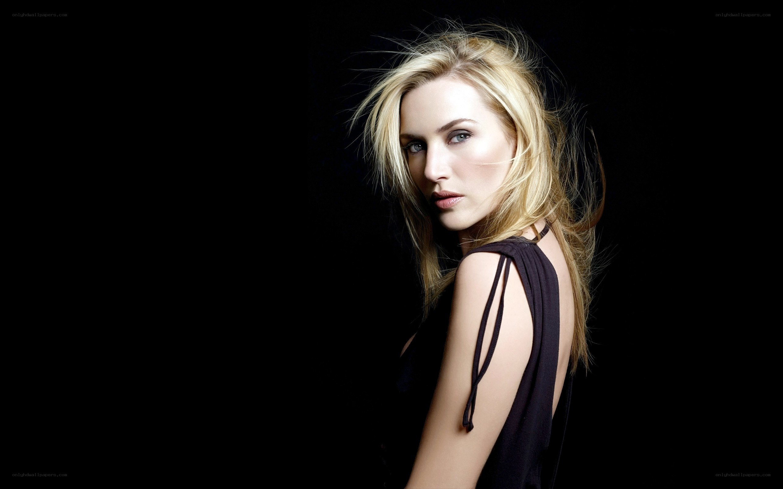 blonde woman in black top