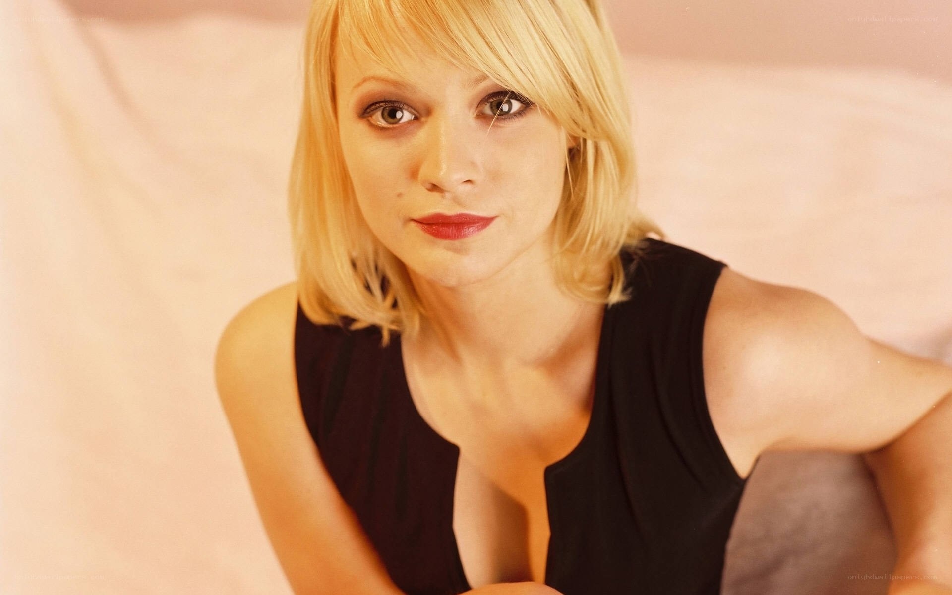 blonde woman in black top