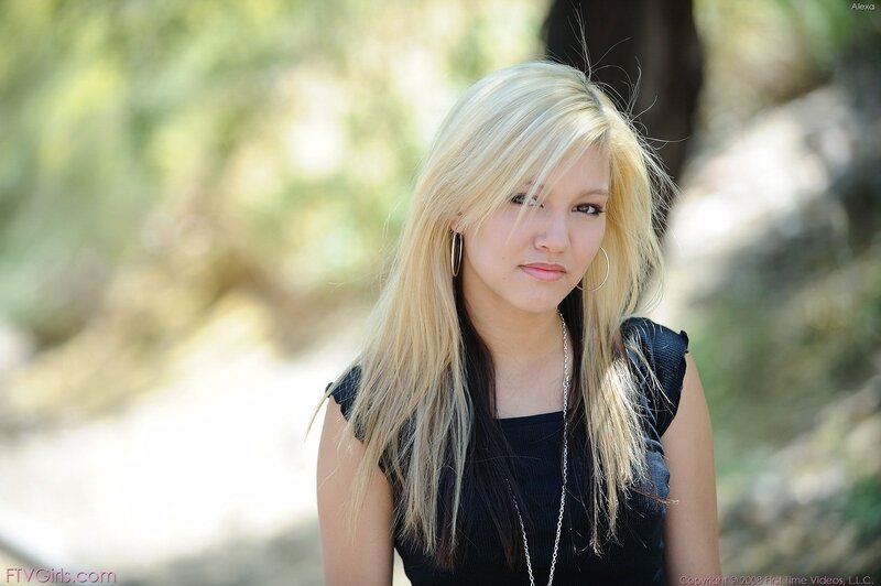 blonde woman in black top
