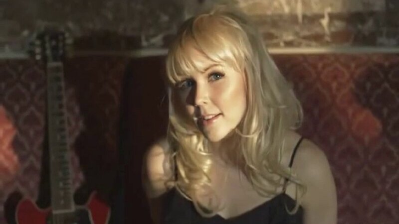 Blonde Woman in Black Top — Intimate