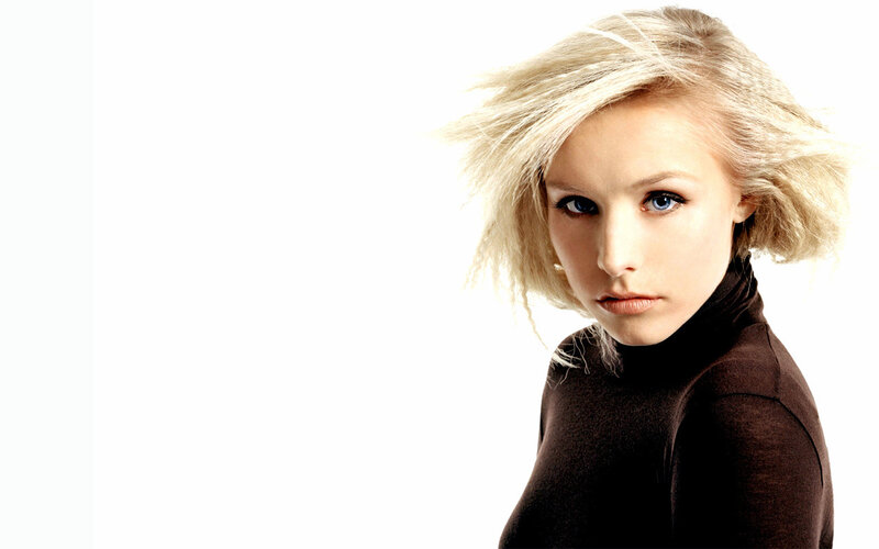 blonde woman in black turtleneck