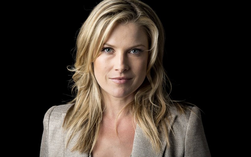 blonde woman in blazer