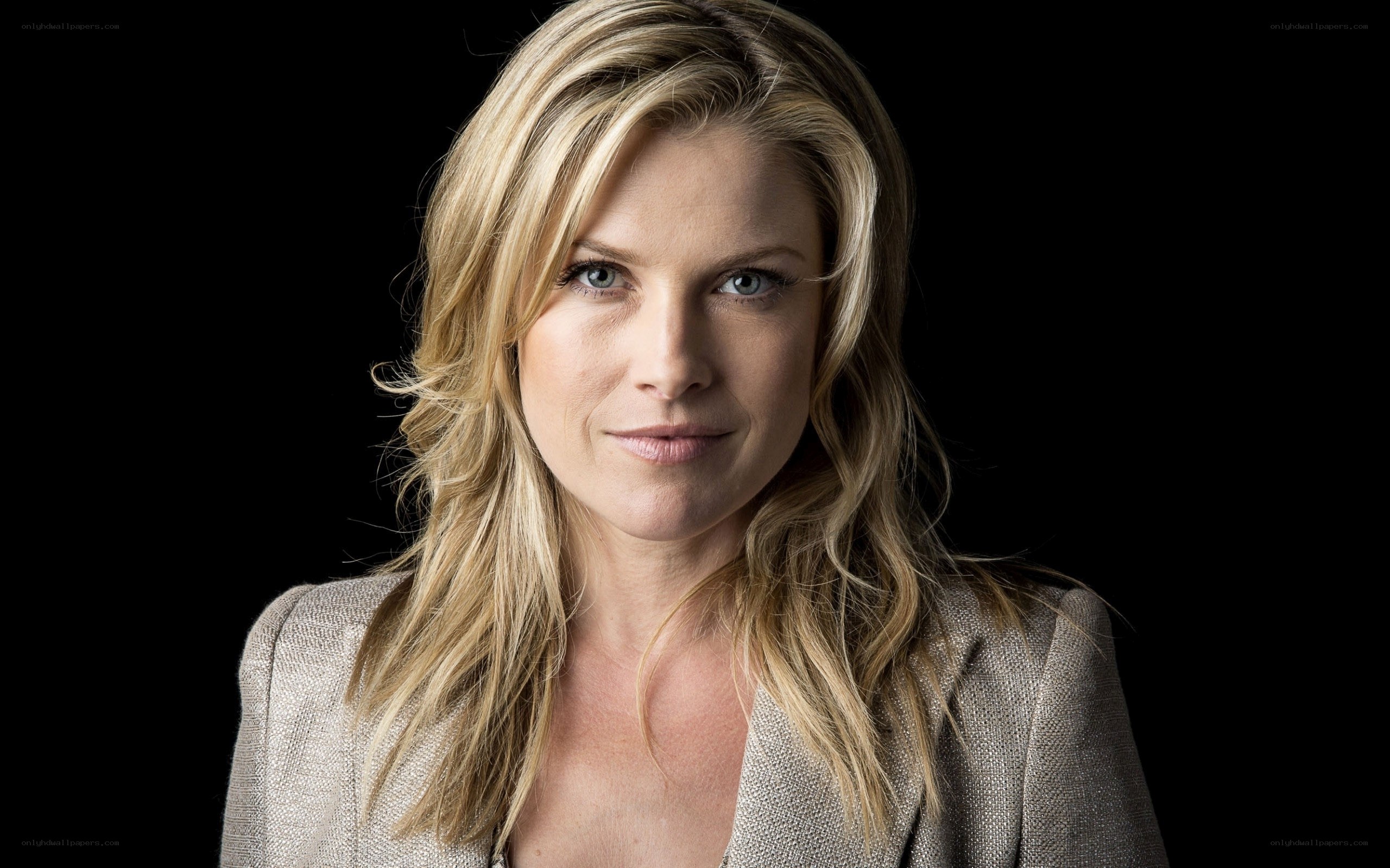 blonde woman in blazer