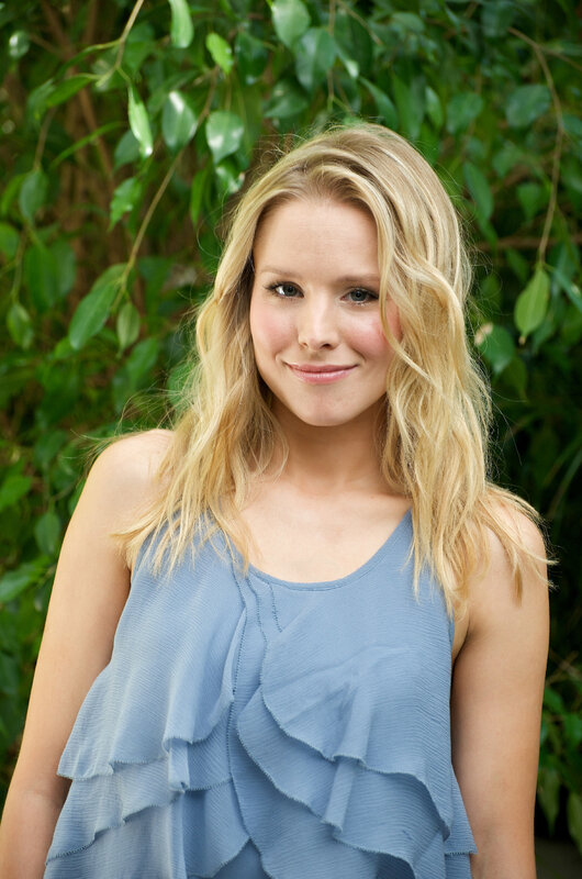 blonde woman in blue top
