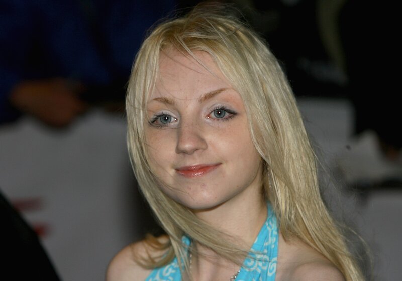 blonde woman in blue top
