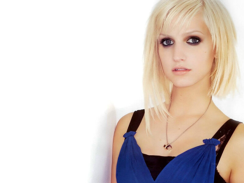blonde woman in blue top