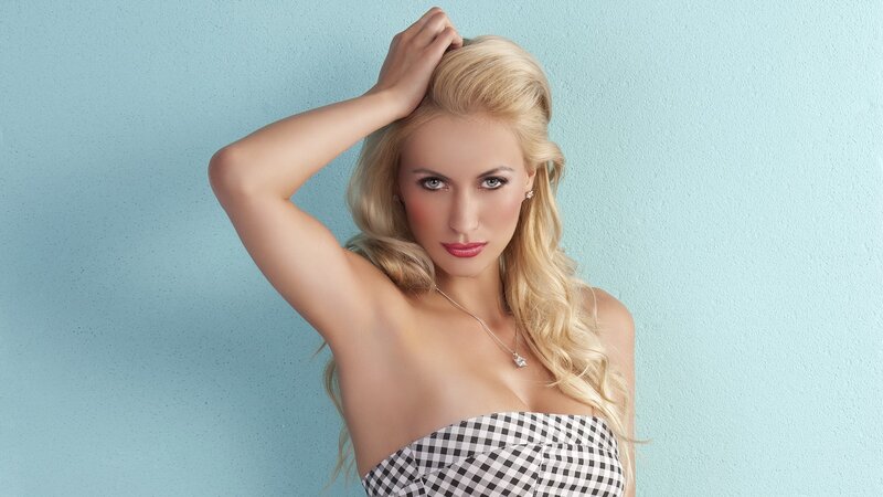 blonde woman in checkered top